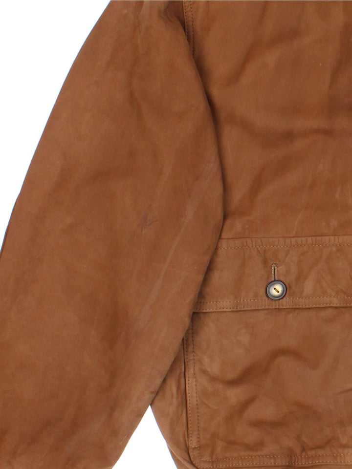 Vintage Leather Bomber Jacket in a brown colourway. Full zip with double button pockets on the front and cuffed hem. 