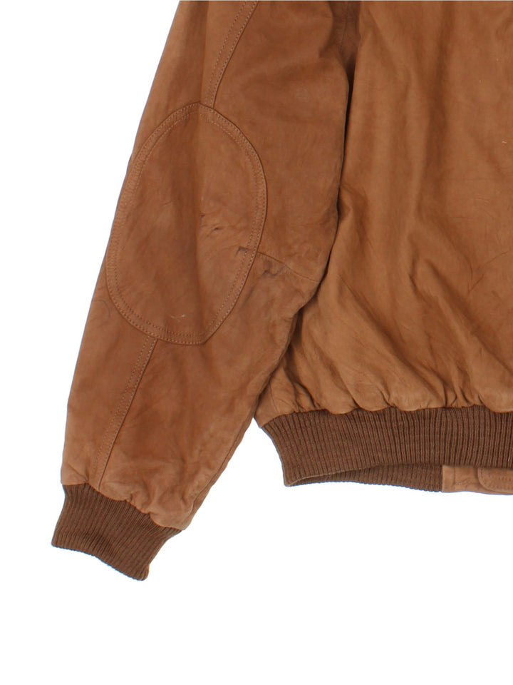 Vintage Leather Bomber Jacket in a brown colourway. Full zip with double button pockets on the front and cuffed hem. 