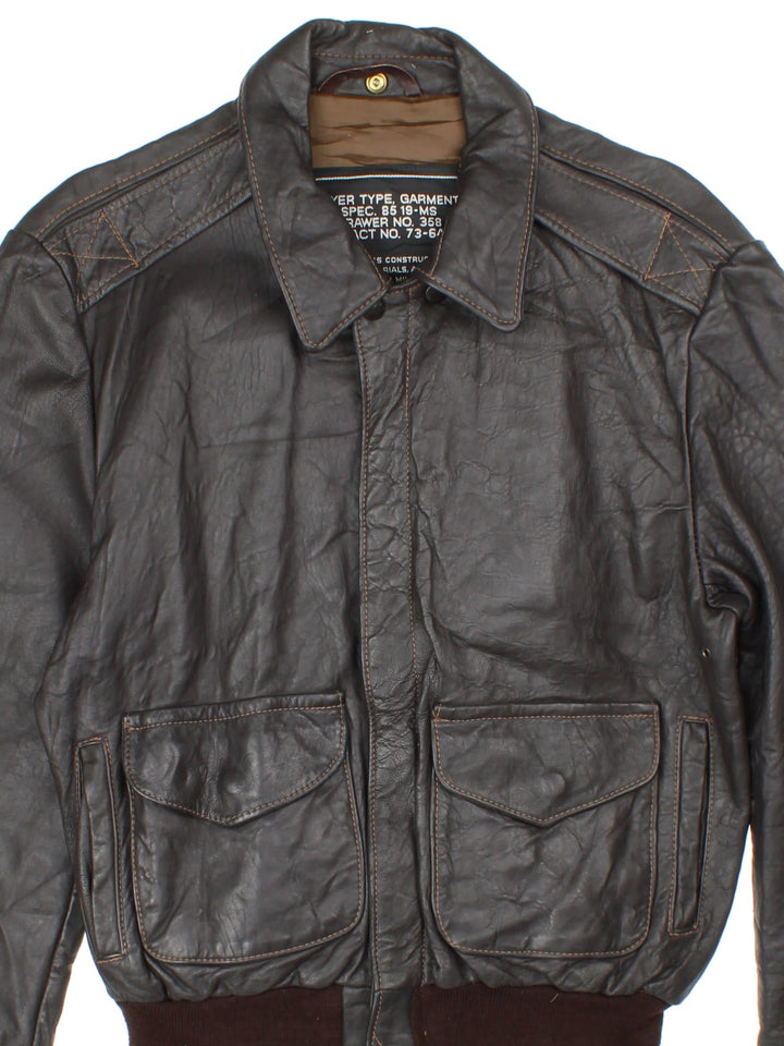 Vintage Schott Leather Bomber Jacket in a brown colourway. Full zip with double front button pocket and cuffed hem..