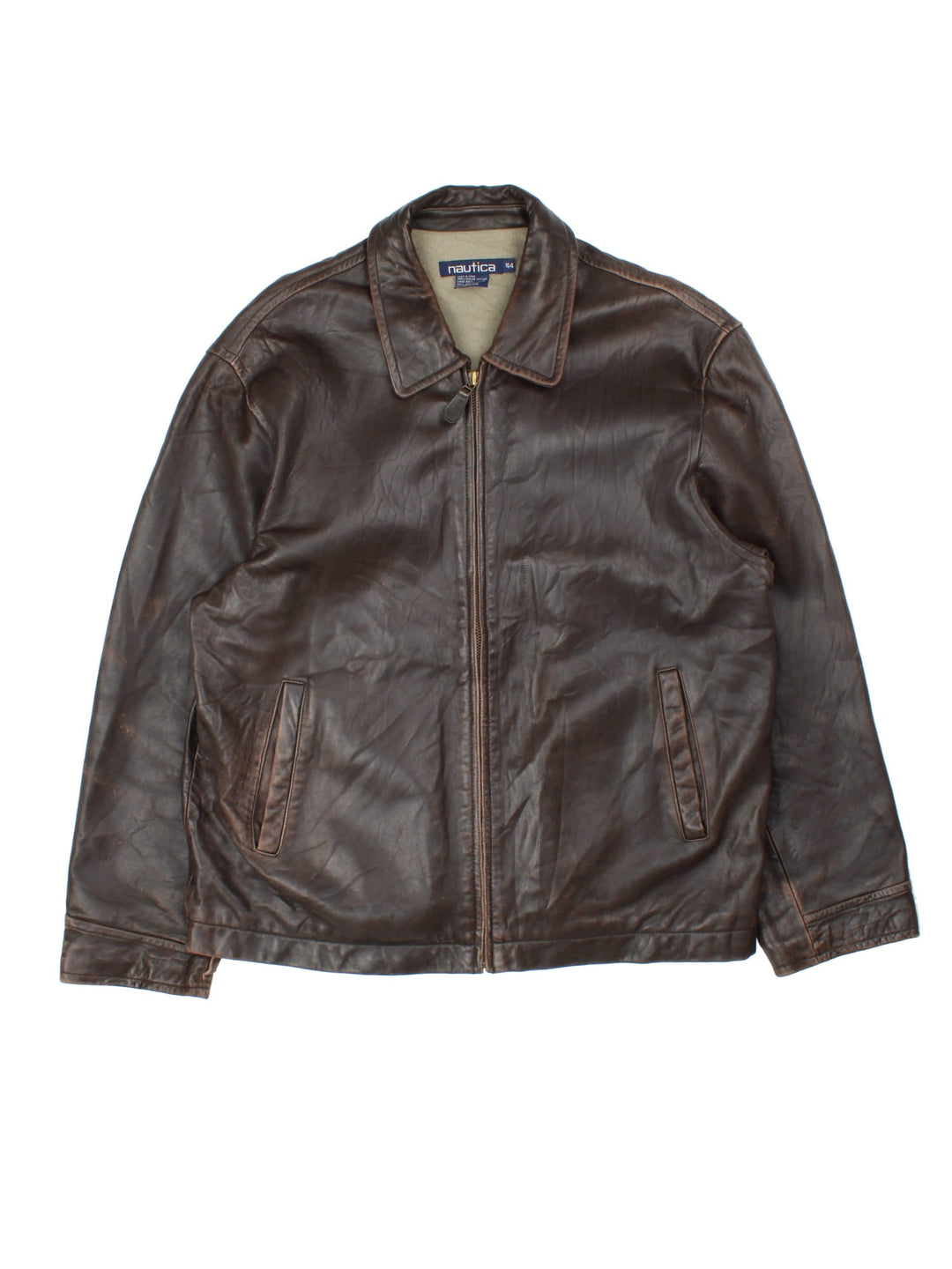 Vintage Nautica Leather Jacket in a brown colourway. Full zip up with double pocket on the front with thin fleece lining.