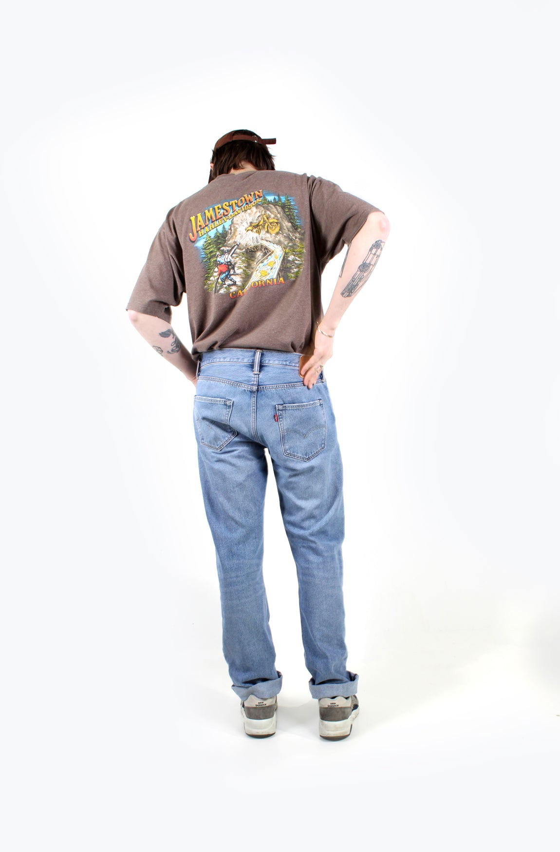 Vintage light wash Levi Strauss 501 jeans straight leg with a button up fly, signature leather patch on the waist band