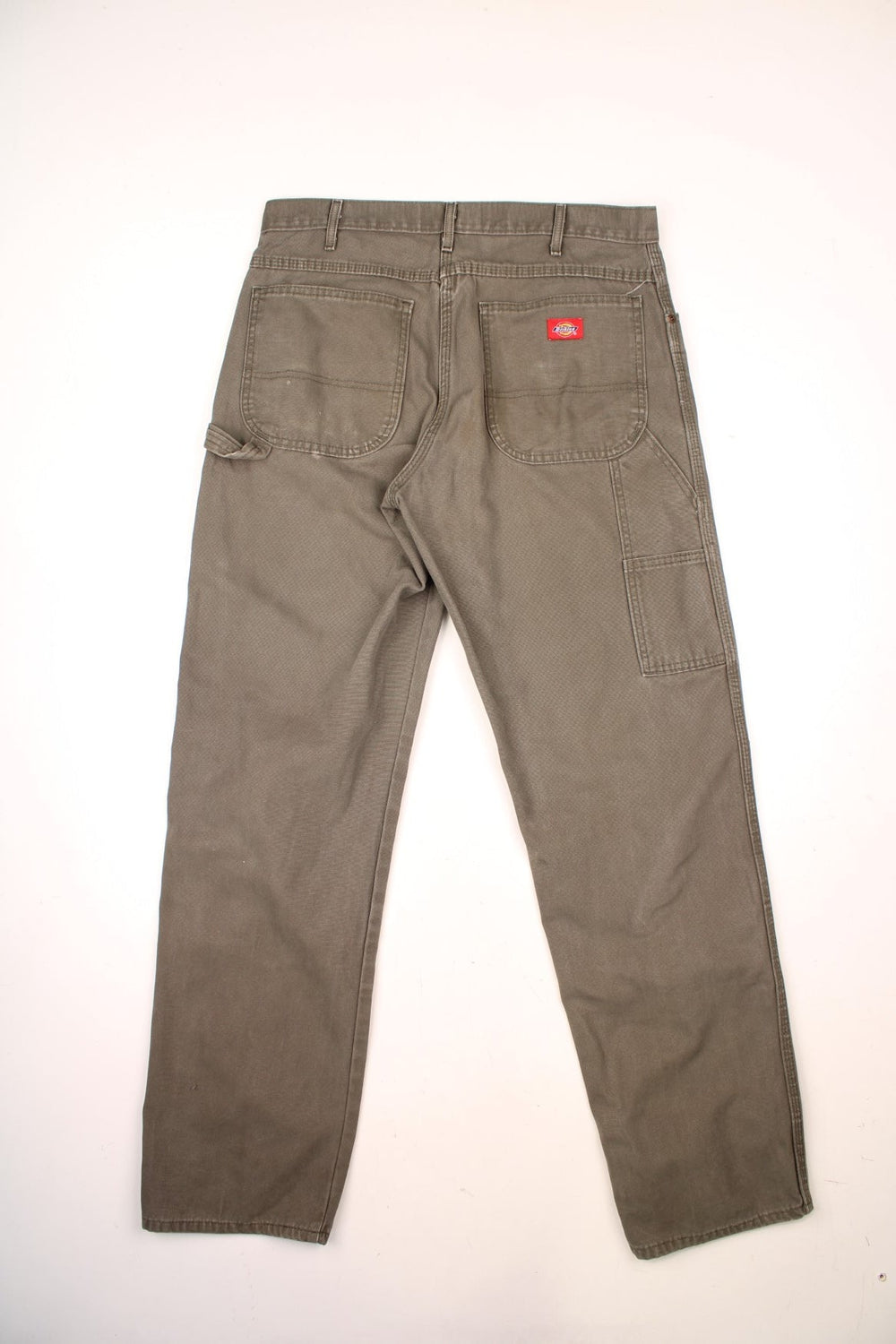 Dickies khaki green carpenter jeans with multiple pockets and logo on the back pocket