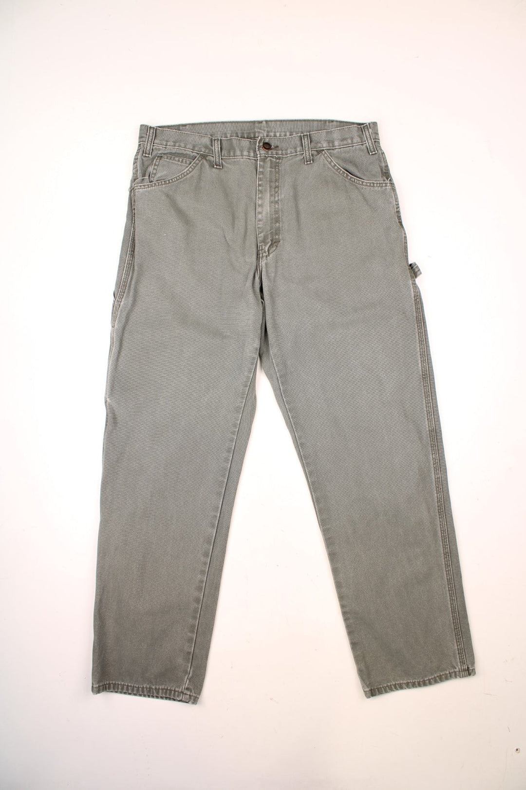 Dickies khaki green carpenter jeans with multiple pockets and logo on the back pocket