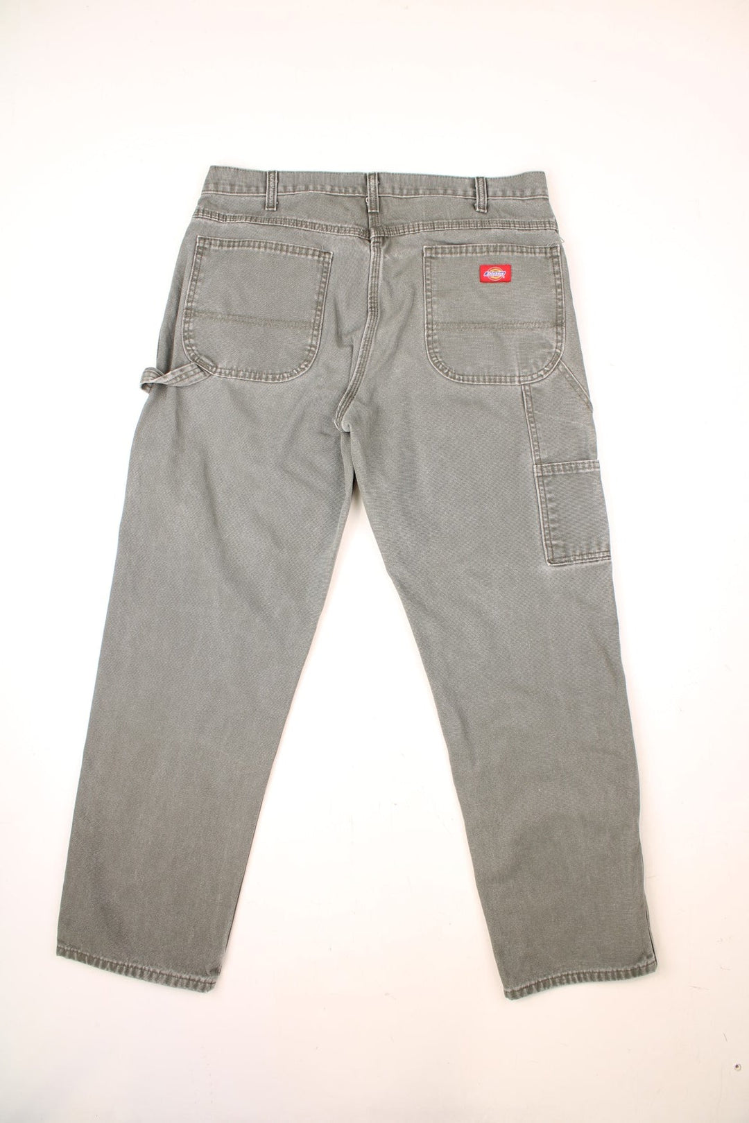 Dickies khaki green carpenter jeans with multiple pockets and logo on the back pocket