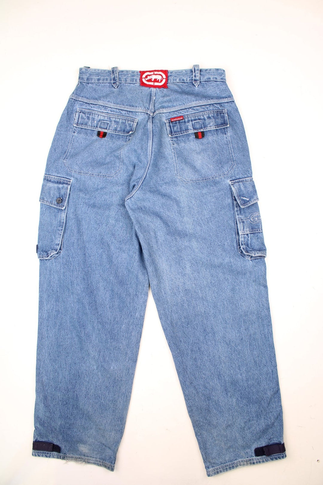 90's Ecko Unltd jeans light wash carpenter jeans, features multiple pockets and embroidered badge on the waist band 