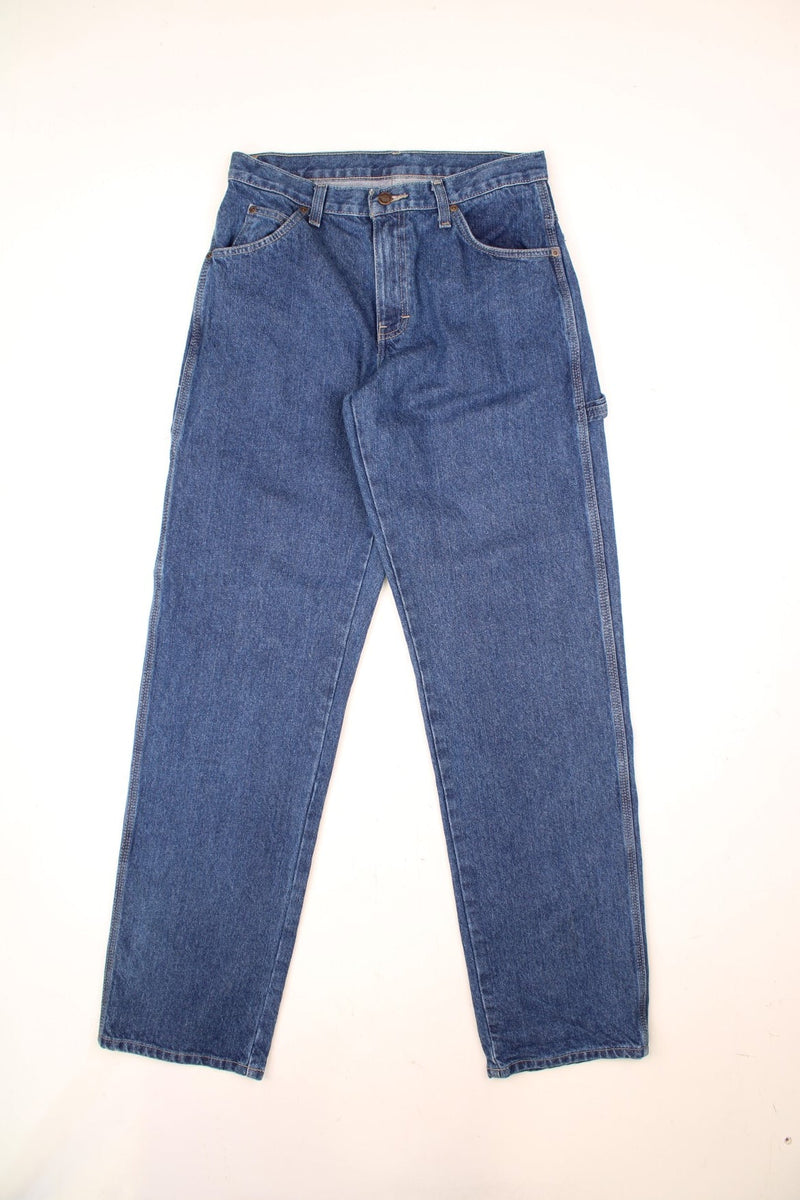 Dickies dark wash carpenter jeans with multiple pockets and logo on the back pocket