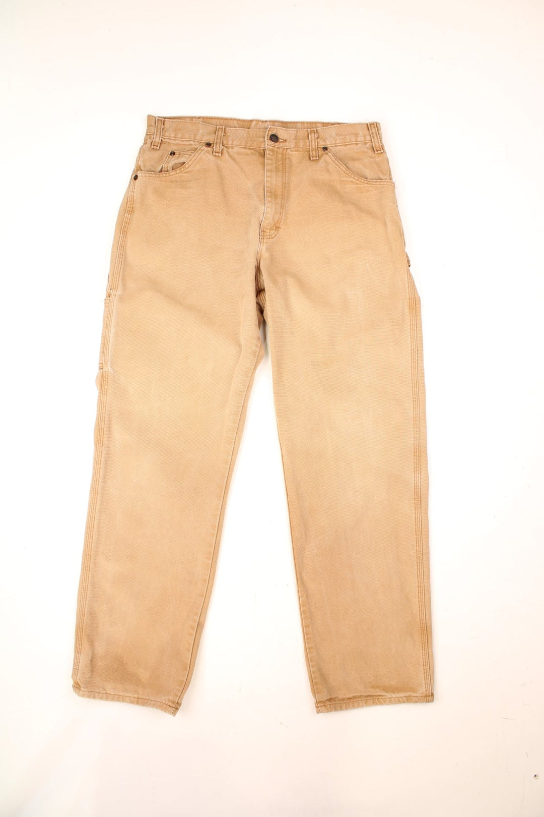 Dickies tan carpenter jeans with multiple pockets and logo on the back pocket