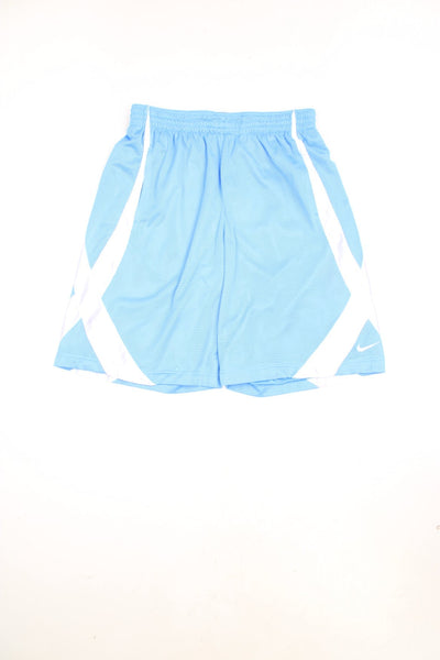 Nike Dri-Fit Basketball Shorts in a blue and white colourway, has and adjustable waist, side pockets and the swoosh logo embroidered on the front. 