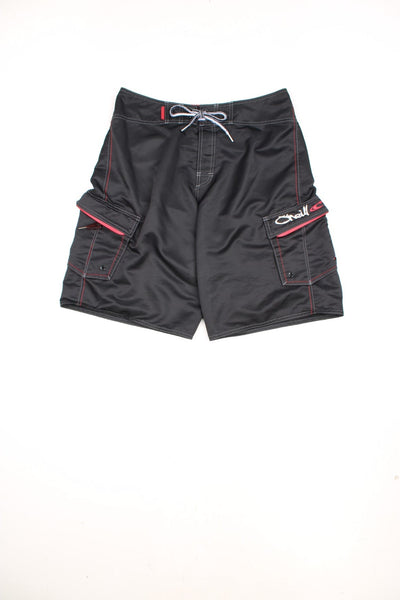 O'Neill Y2K Shorts in a black, grey and red colourway, only has 2 cargo style pockets, adjustable waist and has the logo embroidered on the front and back. 
