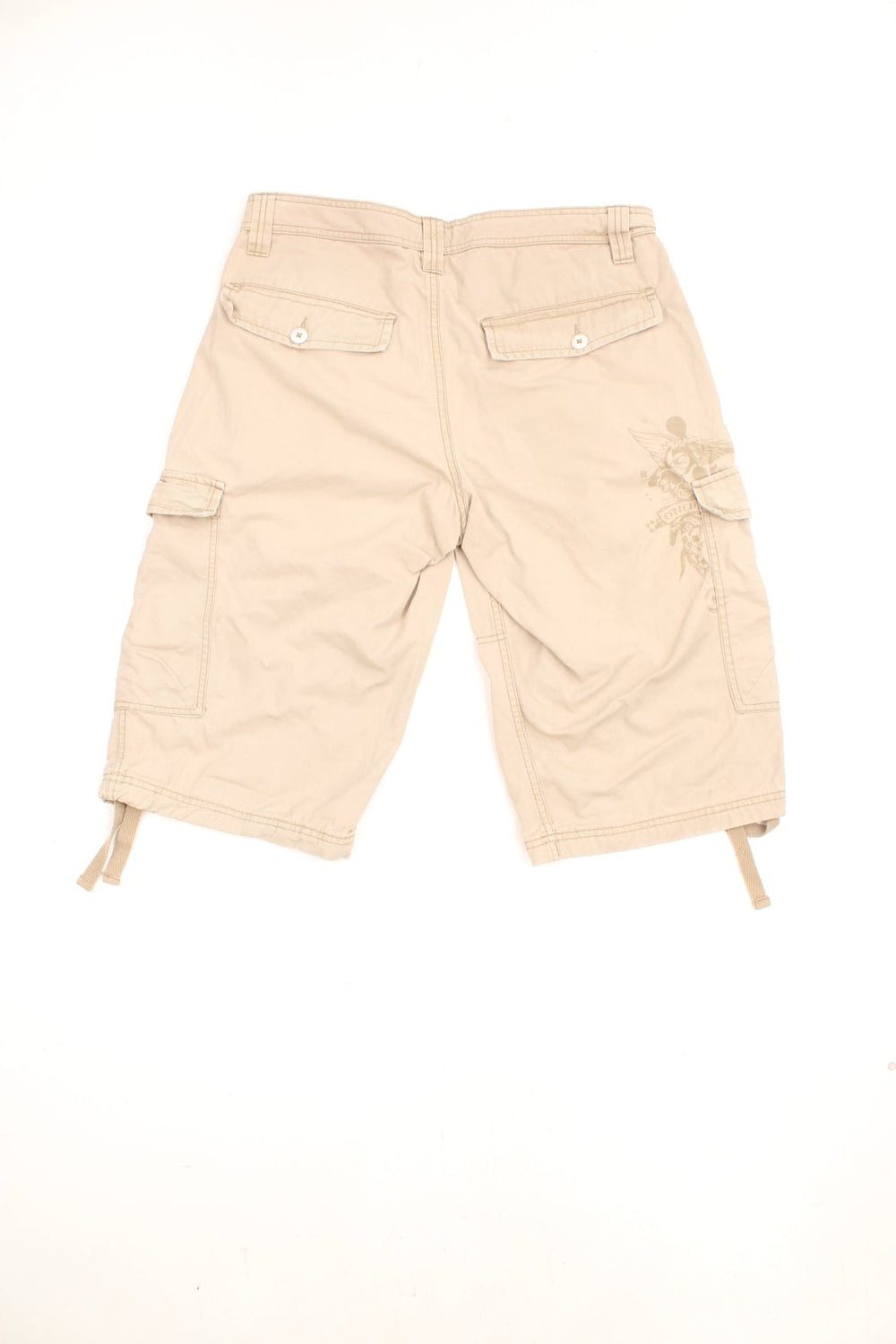 Vintage O'Neill Cargo Shorts in a tanned colourway, has multiple pockets, adjustable cuffs at the bottom, and has the logo graphic printed on the back by the left pocket. 