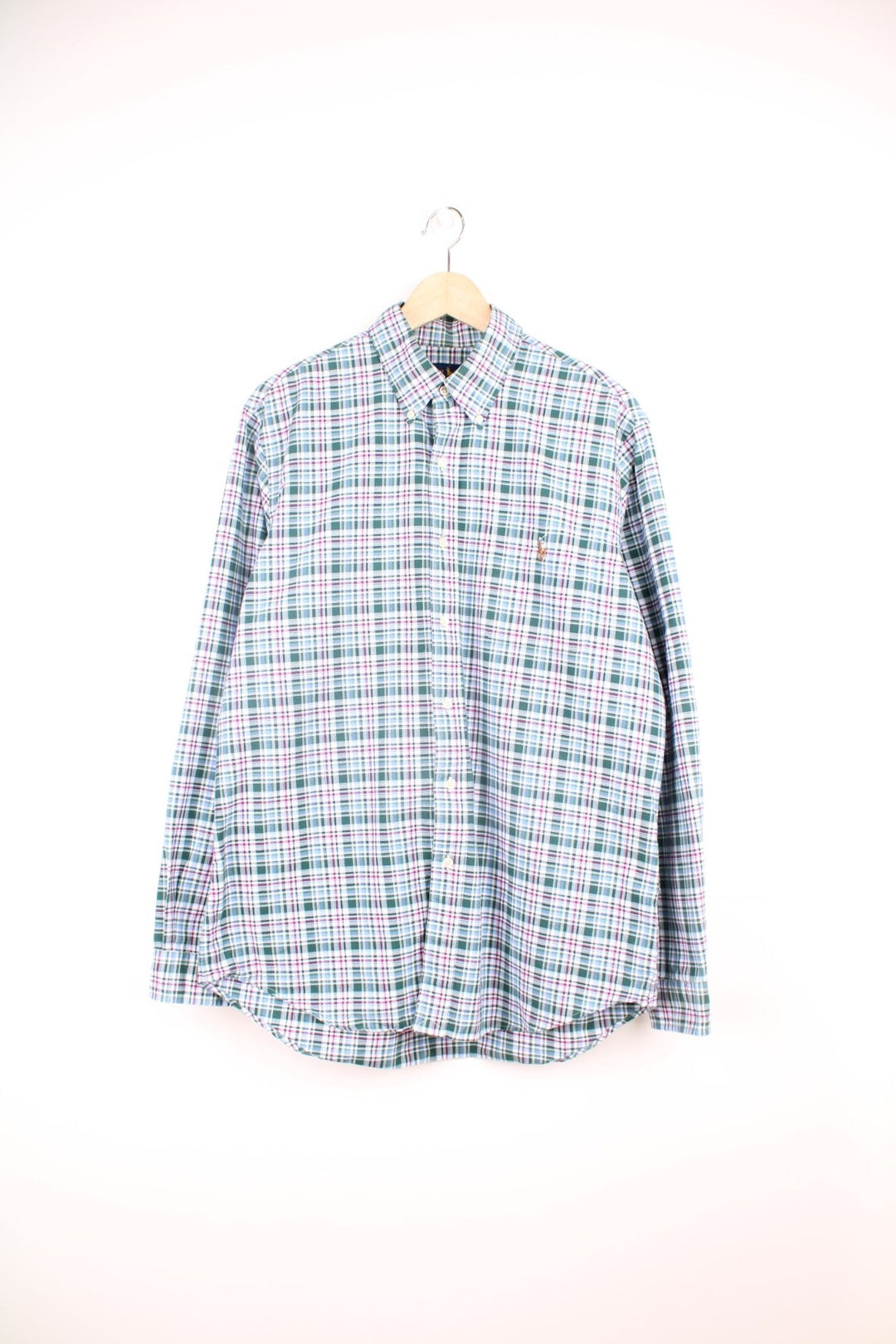 Ralph Lauren Shirt in a green, white and purple plaid colourway, button up, and has a chest pocket with the logo embroidered on it. 