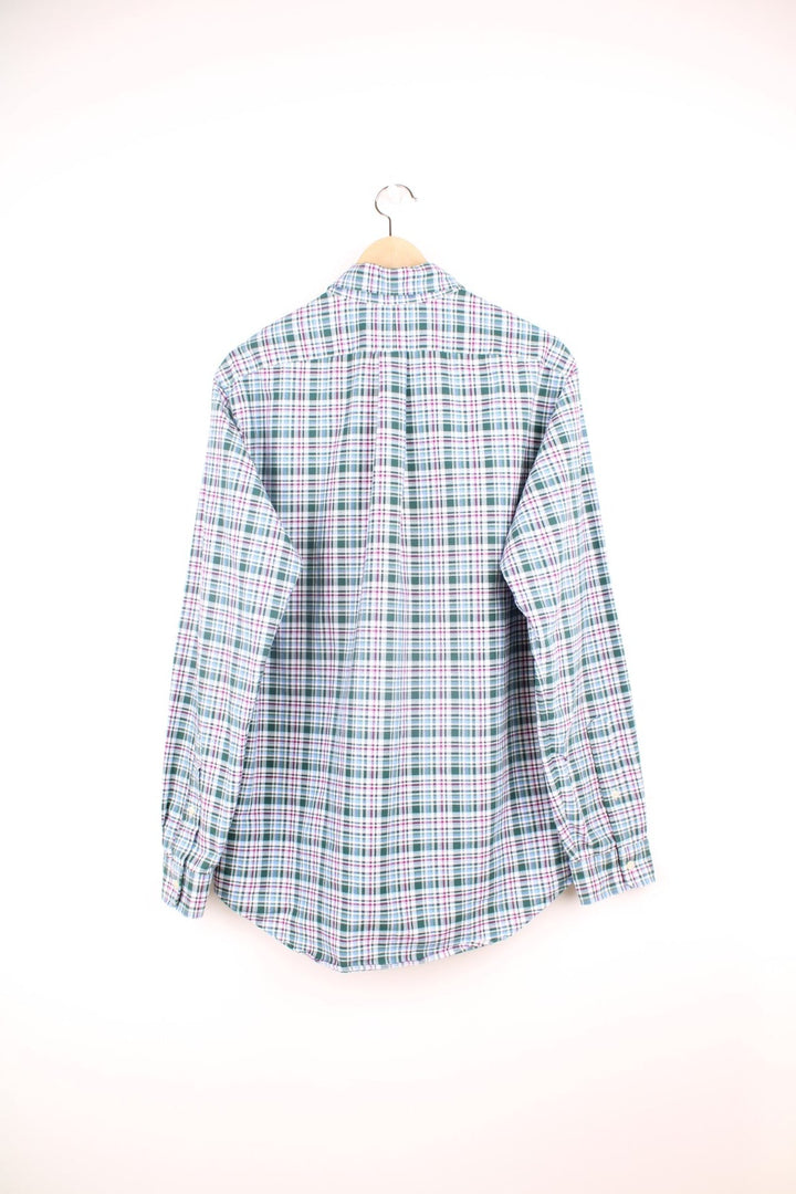 Ralph Lauren Shirt in a green, white and purple plaid colourway, button up, and has a chest pocket with the logo embroidered on it. 