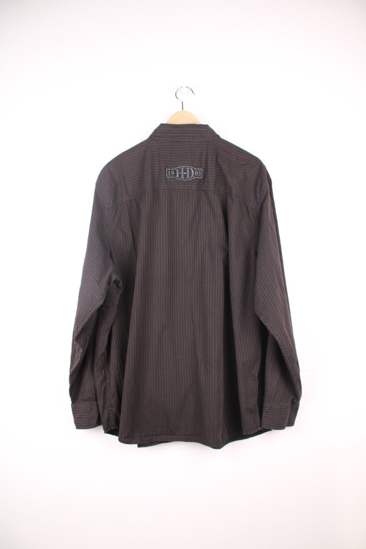 Harley Davidson Shirt in a black and brown striped colourway, button up, has double chest pockets, and the logo embroidered on the front and back. 