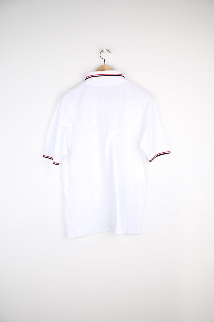 White and red Fred Perry Polo Shirt with embroidered logo on the chest.