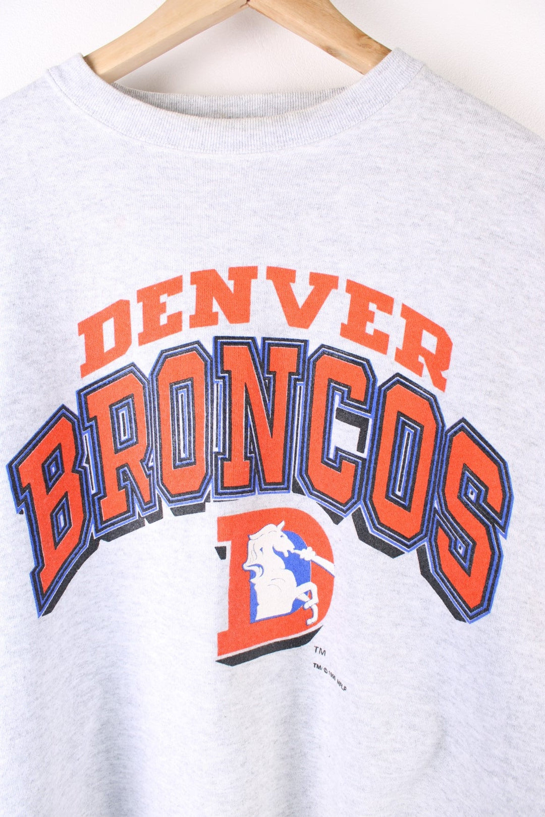 Vintage 1995 Denver Broncos NFL Sweatshirt in a grey colourway with the logo and spell out printed on the front.