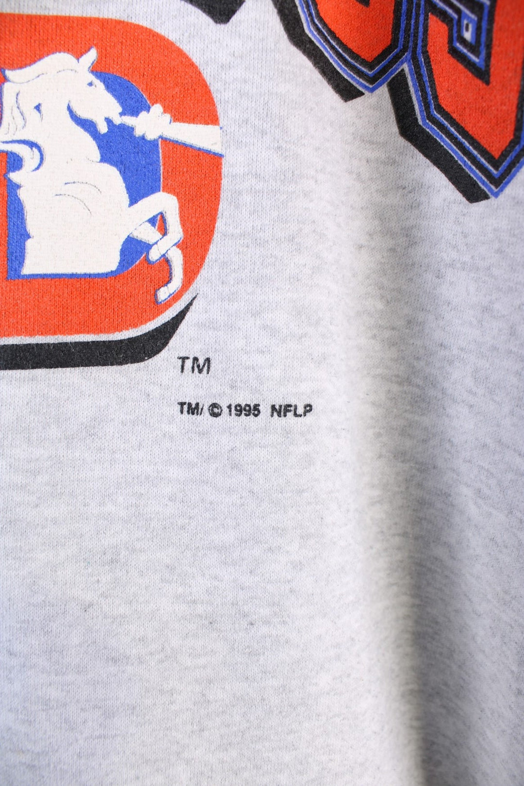 Vintage 1995 Denver Broncos NFL Sweatshirt in a grey colourway with the logo and spell out printed on the front.