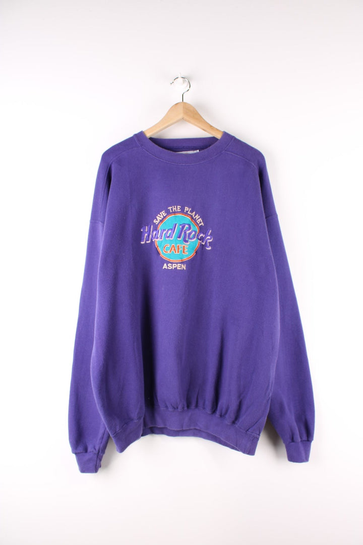 Vintage Hard Rock Cafe Sweatshirt in a purple colourway with the logo embroidered on the front.