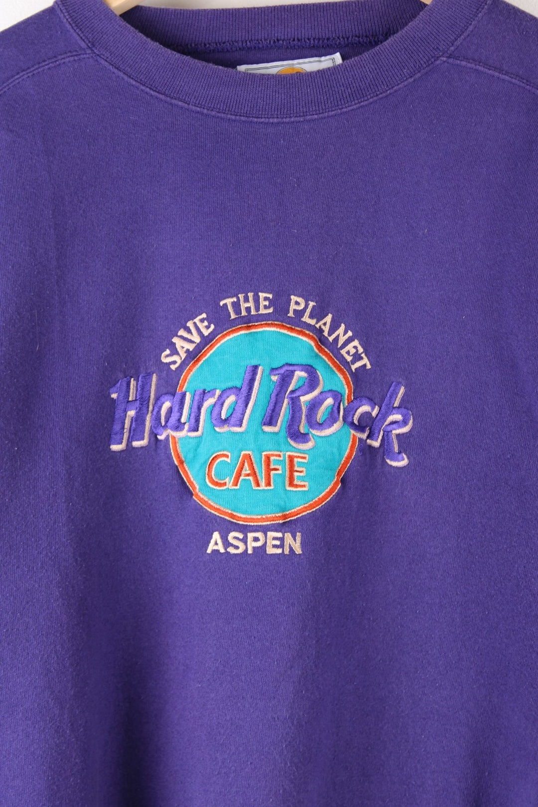 Vintage Hard Rock Cafe Sweatshirt in a purple colourway with the logo embroidered on the front.