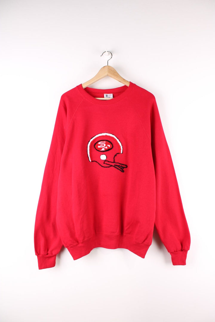 Vintage San Francisco 49ers NFL Sweatshirt in a red colourway with the logo embroidered on the front.