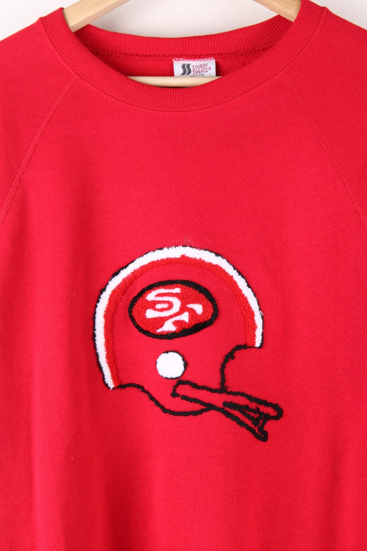 Vintage San Francisco 49ers NFL Sweatshirt in a red colourway with the logo embroidered on the front.