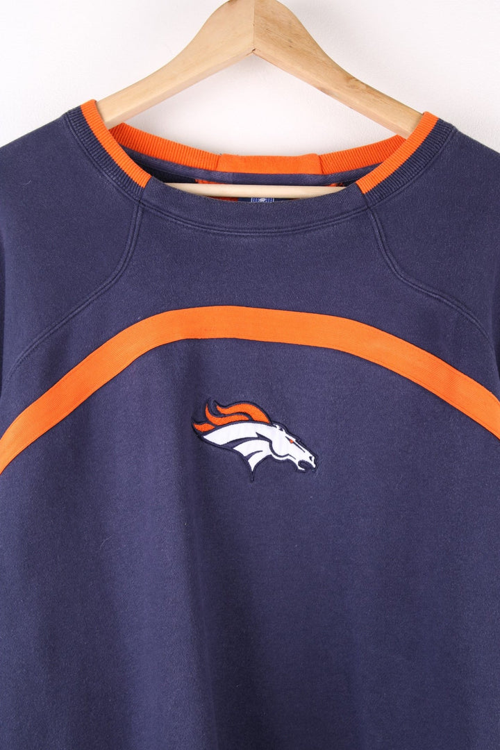 Vintage Denver Broncos NFL Reebok Sweatshirt in a blue and orange colourway with the logo embroidered on the front, and the Reebok and NFL logos on the sleeves.