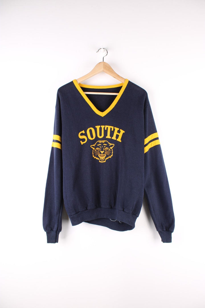 Vintage Southern Wild Cats College Sweatshirt in a blue and yellow colourway with the logo and spell out printed on the front.