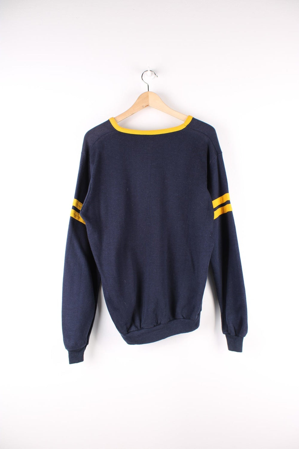 Vintage Southern Wild Cats College Sweatshirt in a blue and yellow colourway with the logo and spell out printed on the front.