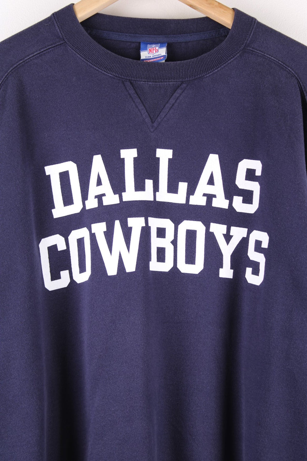 Dallas Cowboys NFL Reebok Sweatshirt in a blue colourway with the team spell out printed across the front.