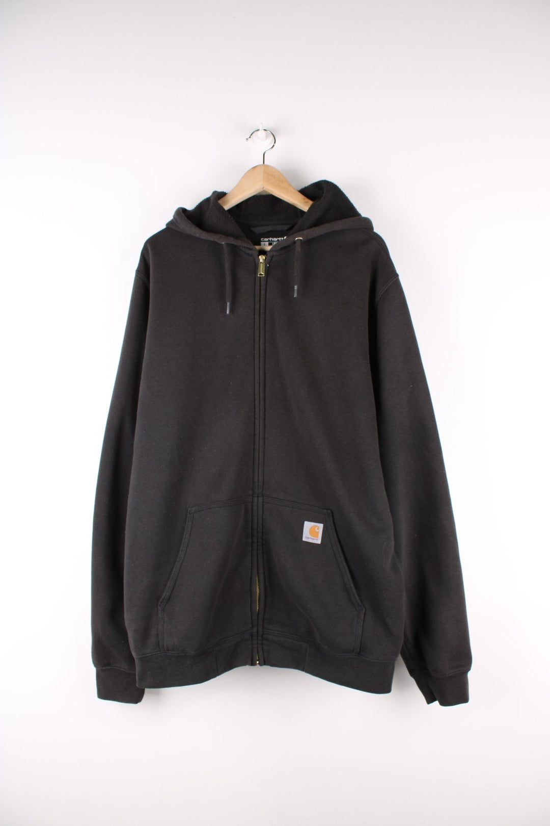 Carhartt Hoodie in a black colourway, zips up with pockets, and has the logo embroidered on the front.