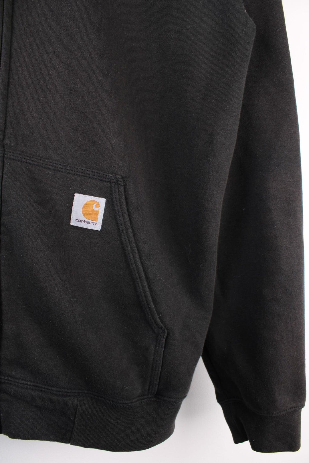 Carhartt Hoodie in a black colourway, zips up with pockets, and has the logo embroidered on the front.