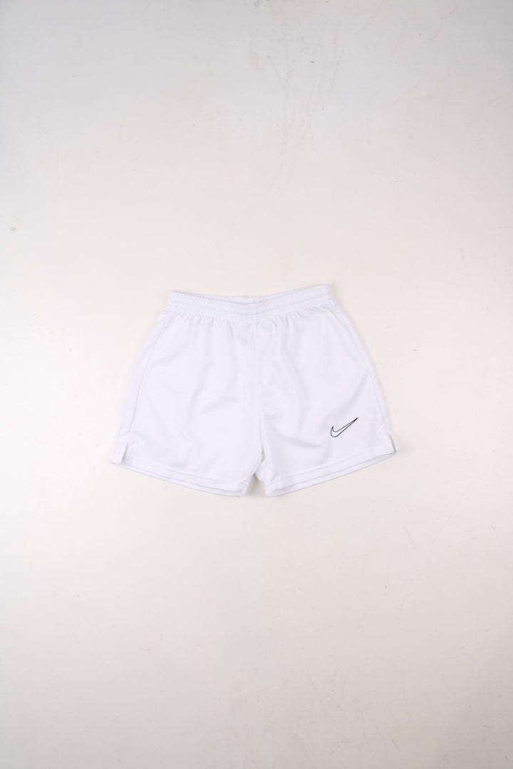 Nike shorts in white with an elasticated waist, and an embroidered logo on the front.