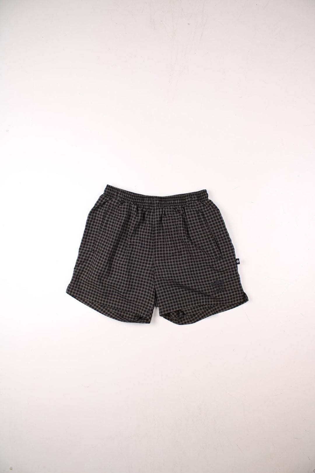 Adidas check shorts in black with an elasticated waist and embroidered trefoil logo.