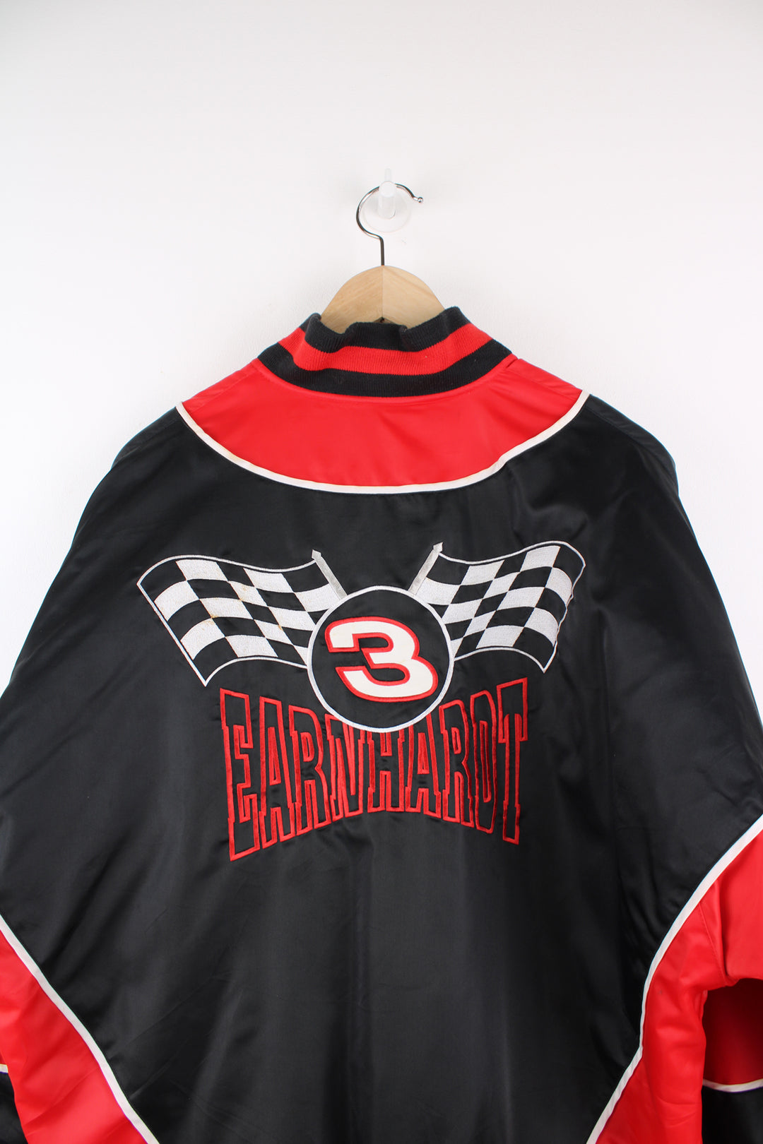 NASCAR's Dale Earnhardt #3 'Intimidator' red and black racing jacket, features embroidered spell-out details  