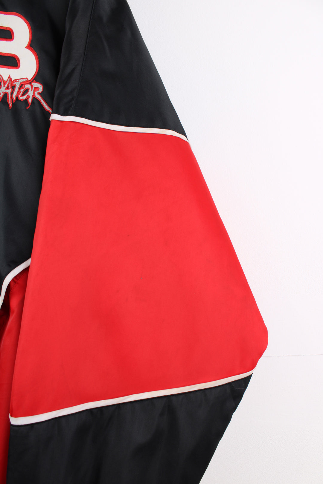 NASCAR's Dale Earnhardt #3 'Intimidator' red and black racing jacket, features embroidered spell-out details  