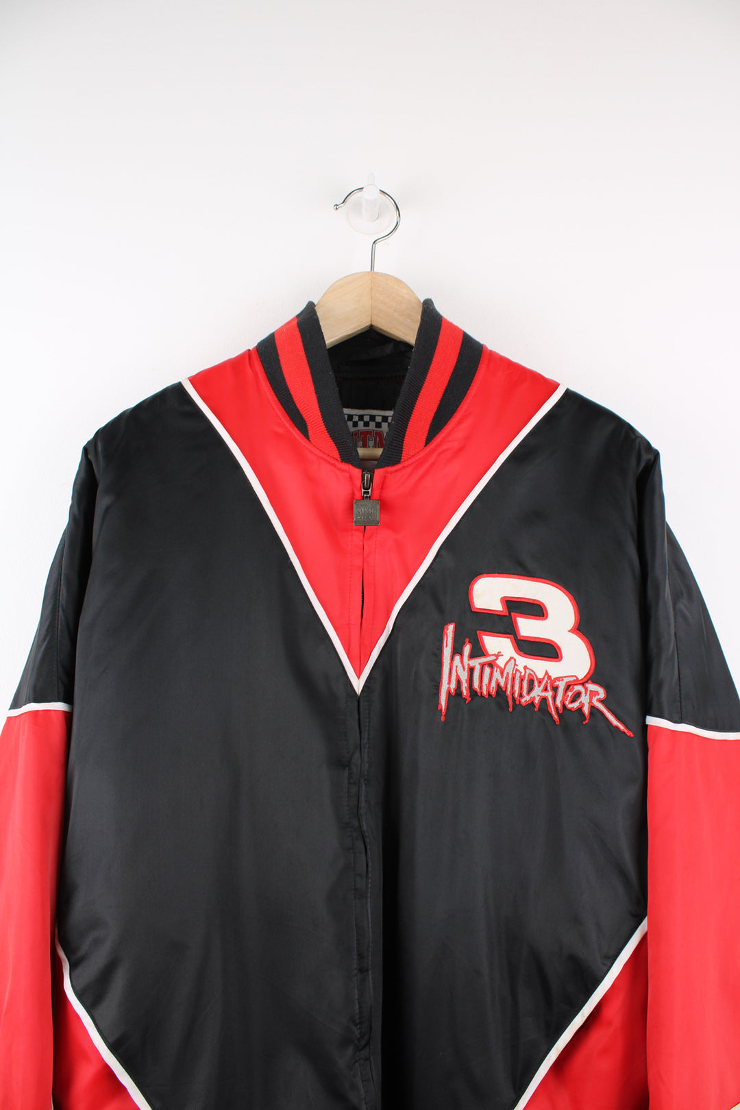 NASCAR's Dale Earnhardt #3 'Intimidator' red and black racing jacket, features embroidered spell-out details  