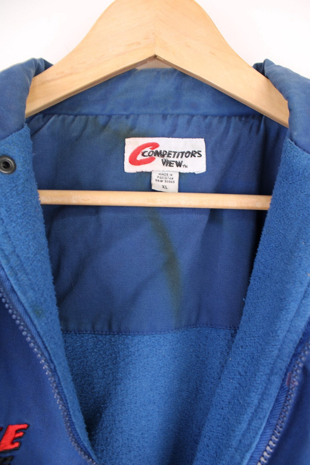 Vintage Rusty Wallace, Penske Racing, zip through NASCAR jacket in blue and grey. Features embroidered sponsor logos, badge on the chest and Rusty Wallace across the back.