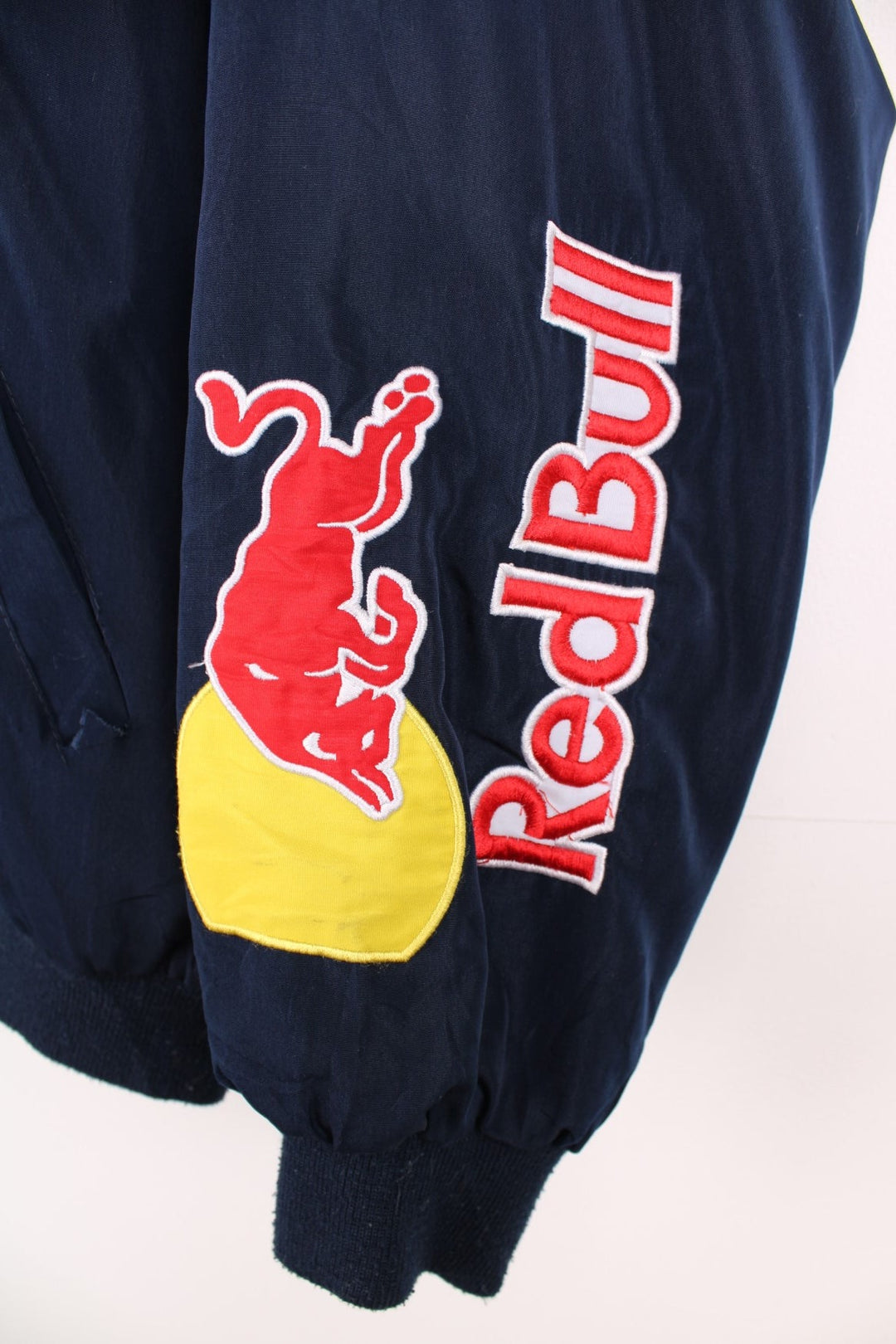 Vintage 90s/Y2K Red Bull, Formula 1, Sauber Petronas zip through racing jacket in navy blue. Features embroidered badges and logo across the chest.