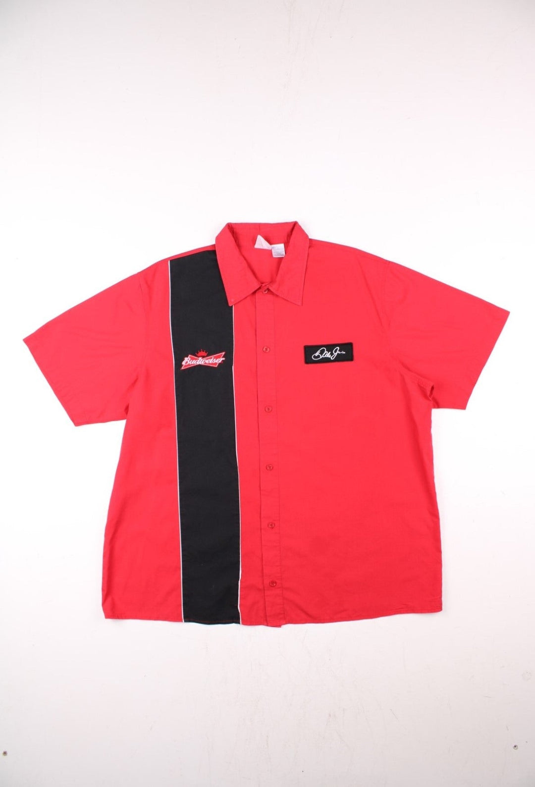 Vintage Winners Circle Budweiser Dale Jr. NASCAR short-sleeved bowling shirt in red with a black stripe, white piping, and button closure .