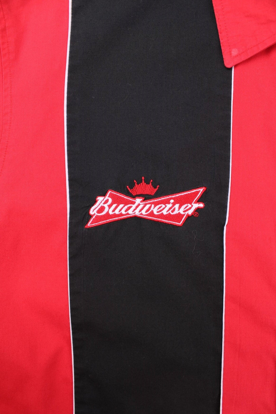 Vintage Winners Circle Budweiser Dale Jr. NASCAR short-sleeved bowling shirt in red with a black stripe, white piping, and button closure .