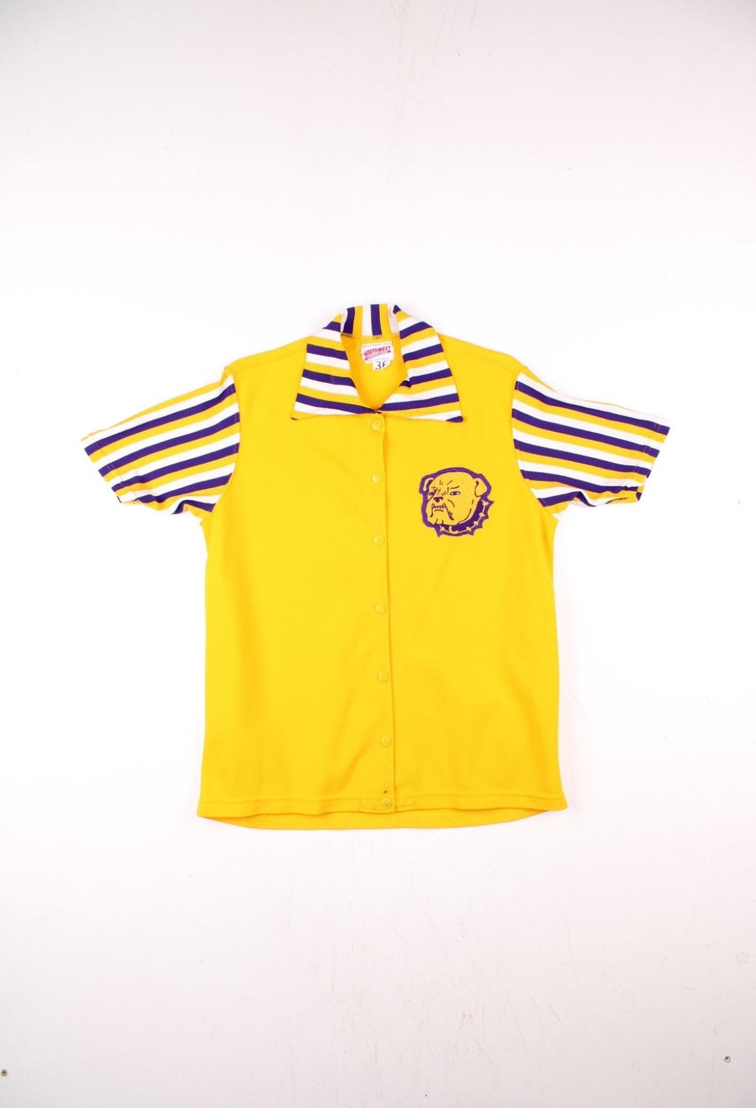 Vintage Bowling Shirt jersey in yellow with purple and white striped sleeves colourway, snap closure, a bulldog logo embroidered on the front and 'Rolla' on the back.