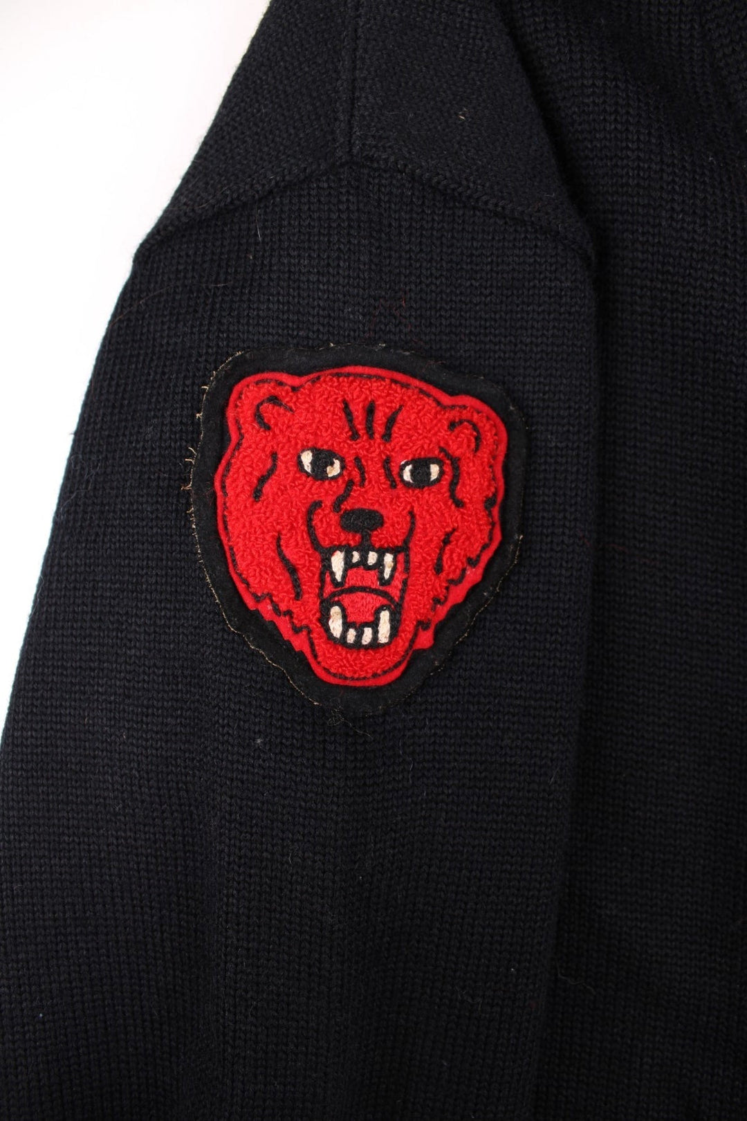 Vintage Dehen Wool Letterman Cardigan in black with button closure, two pockets, and red embroidery of a large letter T, number 74, and a tiger badge on the right sleeve.