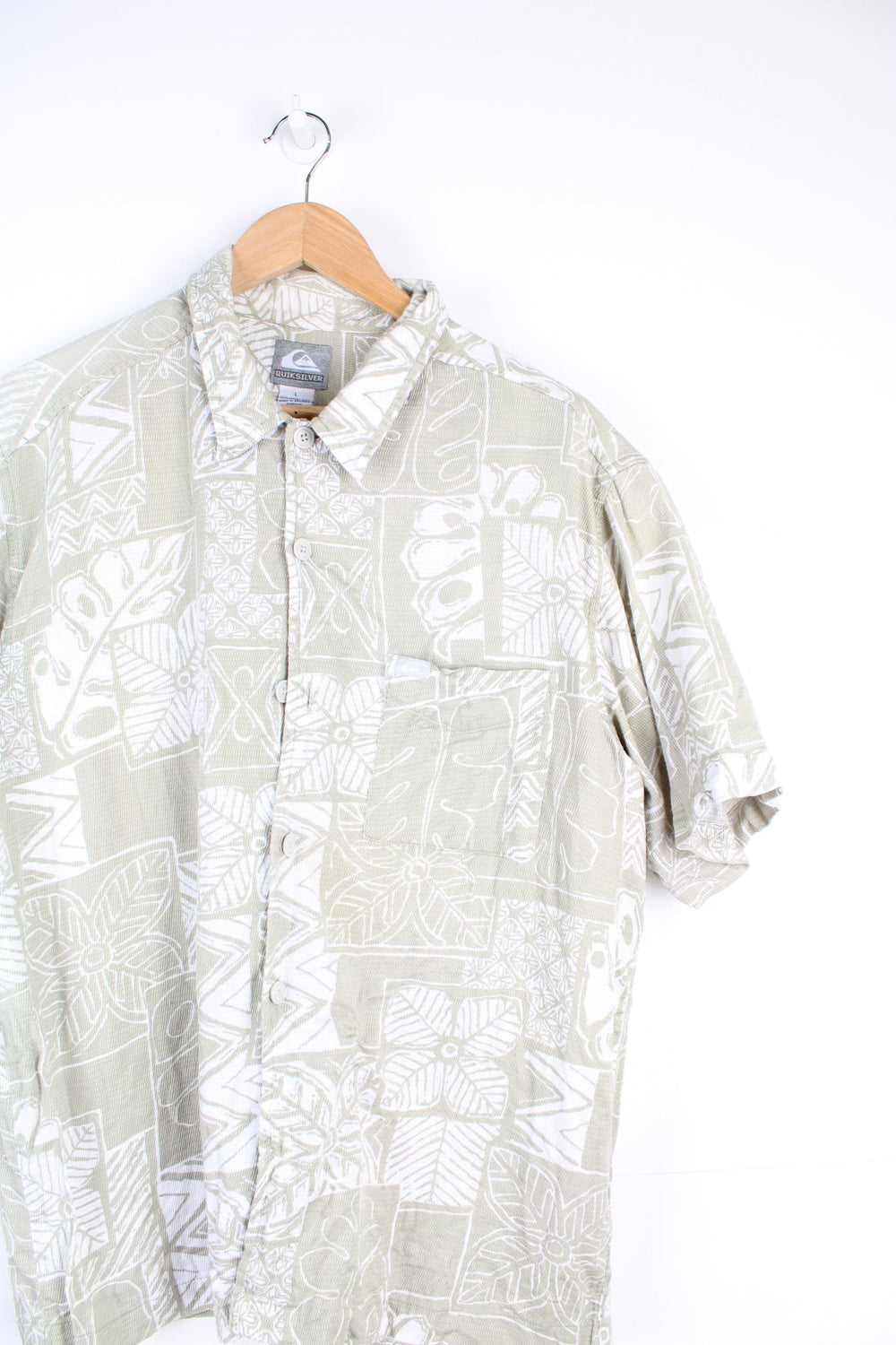 Quiksilver Hawaiian style shirt in sage green and white. Features chest pocket and embroidered logo. 