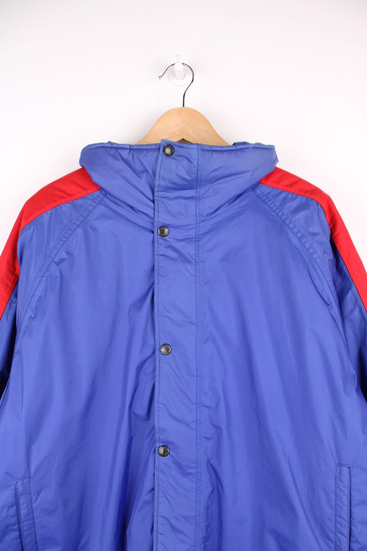 Vintage 1990's The North Face 'Extreme' padded Gore-Text jacket in a purple/blue colour way. Made in the USA . features embroidered logo on the shoulder