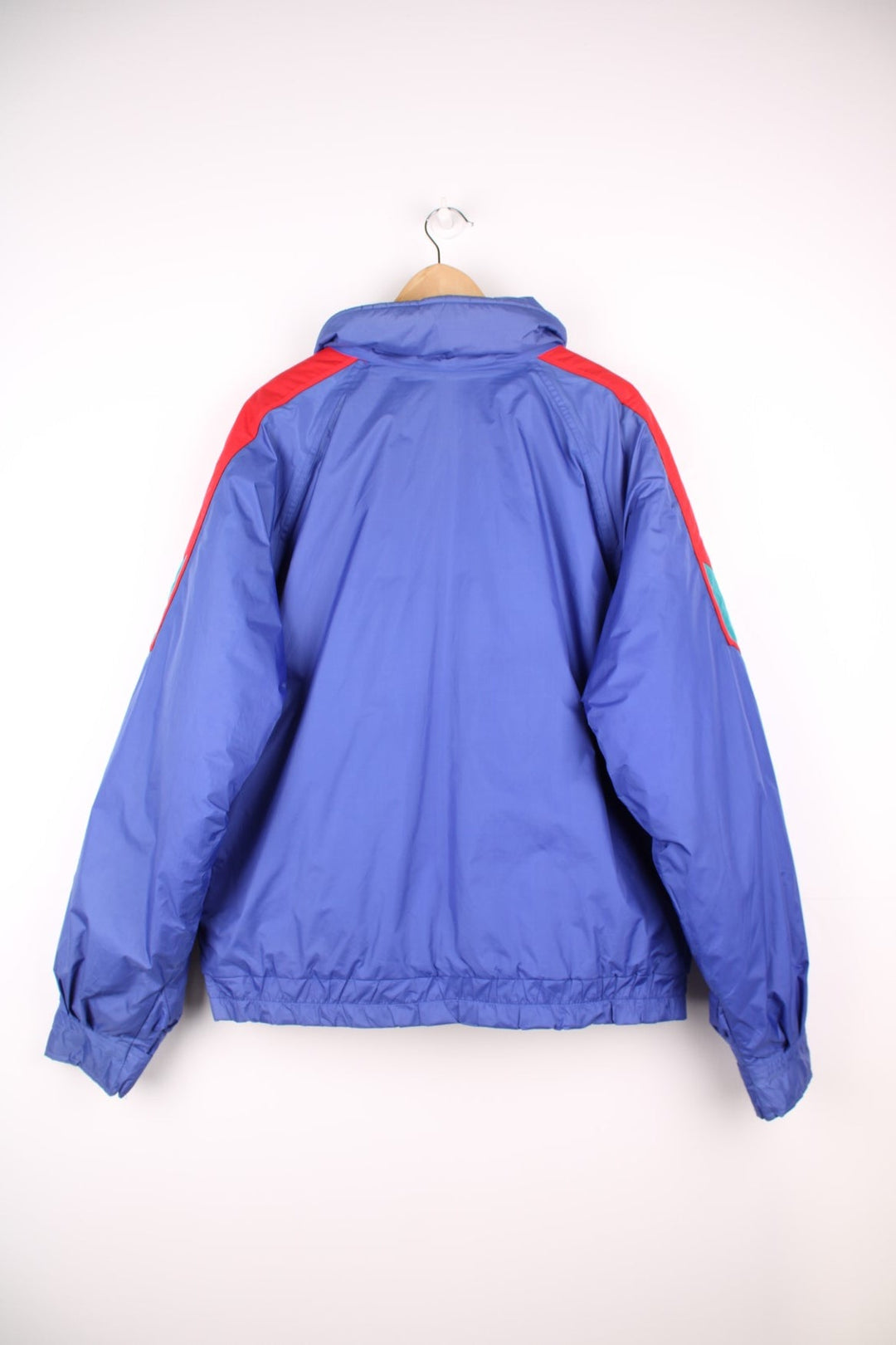 Vintage 1990's The North Face 'Extreme' padded Gore-Text jacket in a purple/blue colour way. Made in the USA . features embroidered logo on the shoulder