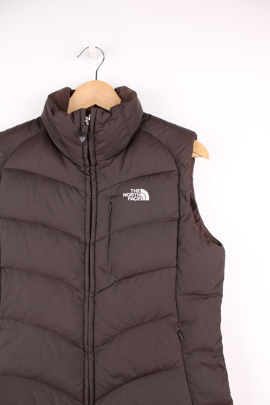 The North Face 600 brown double pocket gilet with embroidered logo on the front and back