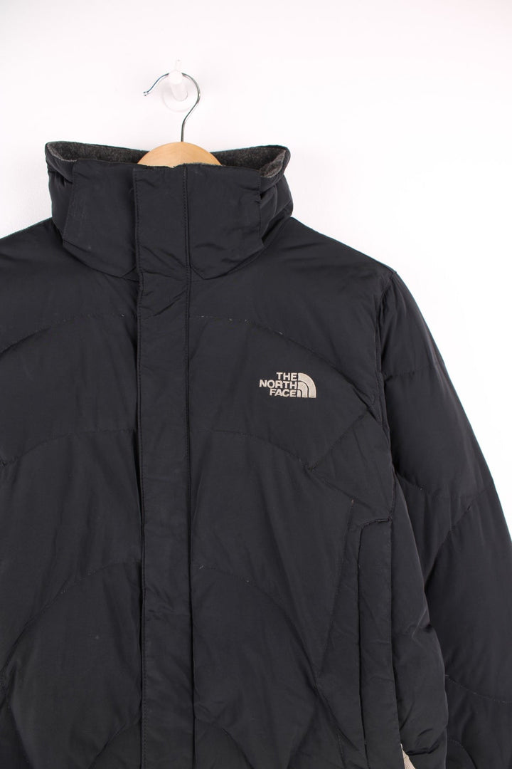 The North Face 600 black zip through bomber style puffer jacket with embroidered logos on the front and back