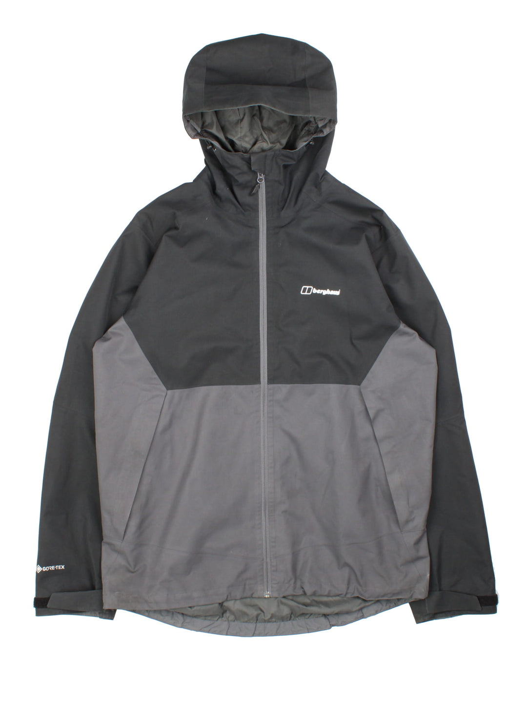 Berghaus Gortex Jacket in a black and grey colourway. Gortex waterproof shell with zip pockets and classic logo on the front.