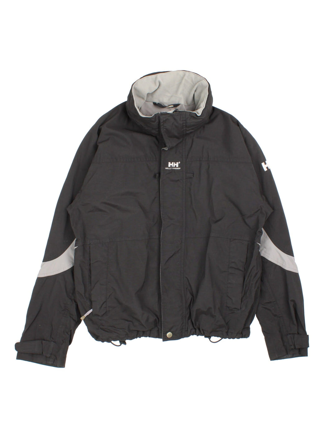 Helly Hansen Jacket in a black colourway. Multiple zip pockets and drawstring hem, and has the logo embroidered across the back and small logo on front and sleeve.