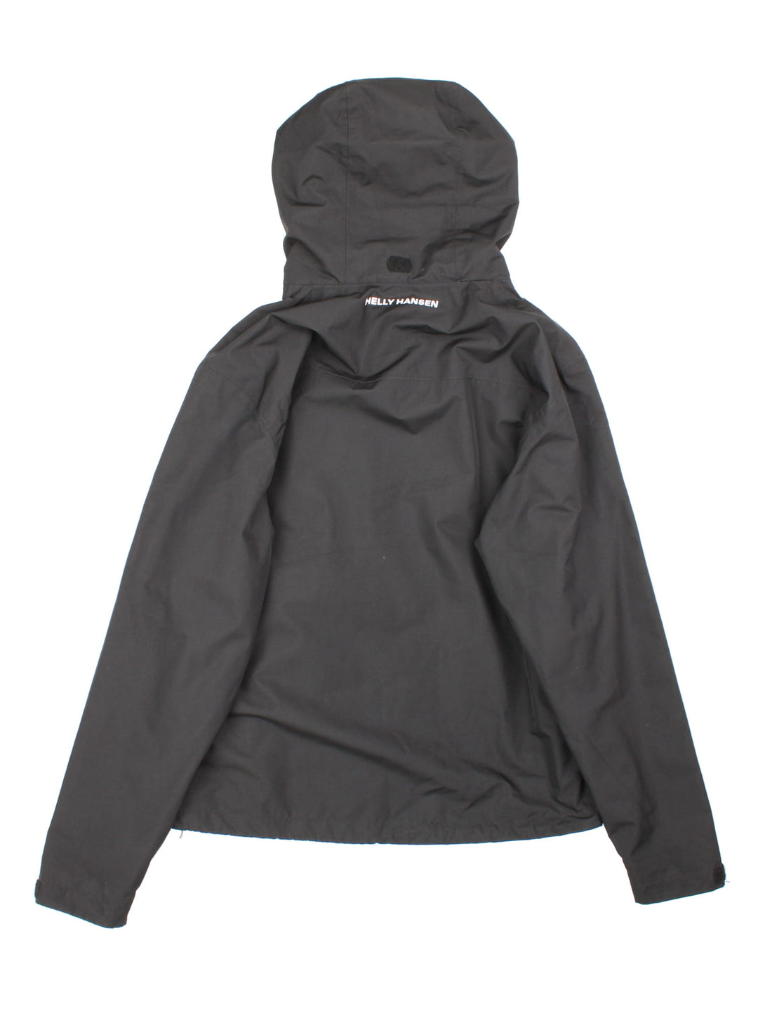 Helly Hansen Jacket in a black colourway. Multiple pockets, hooded, and has the brand logo on front and on the back under the hood.