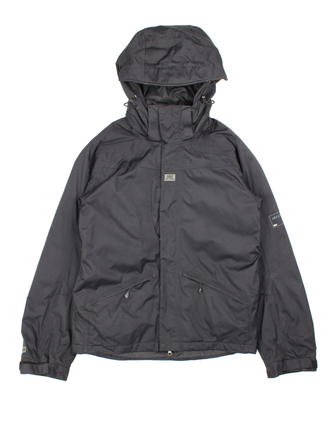 Helly Hansen Jacket in a black colourway. Multiple pockets on front, sides and inside. Drawstring hood and has the small logo embroidered on the sleeve and on the front.